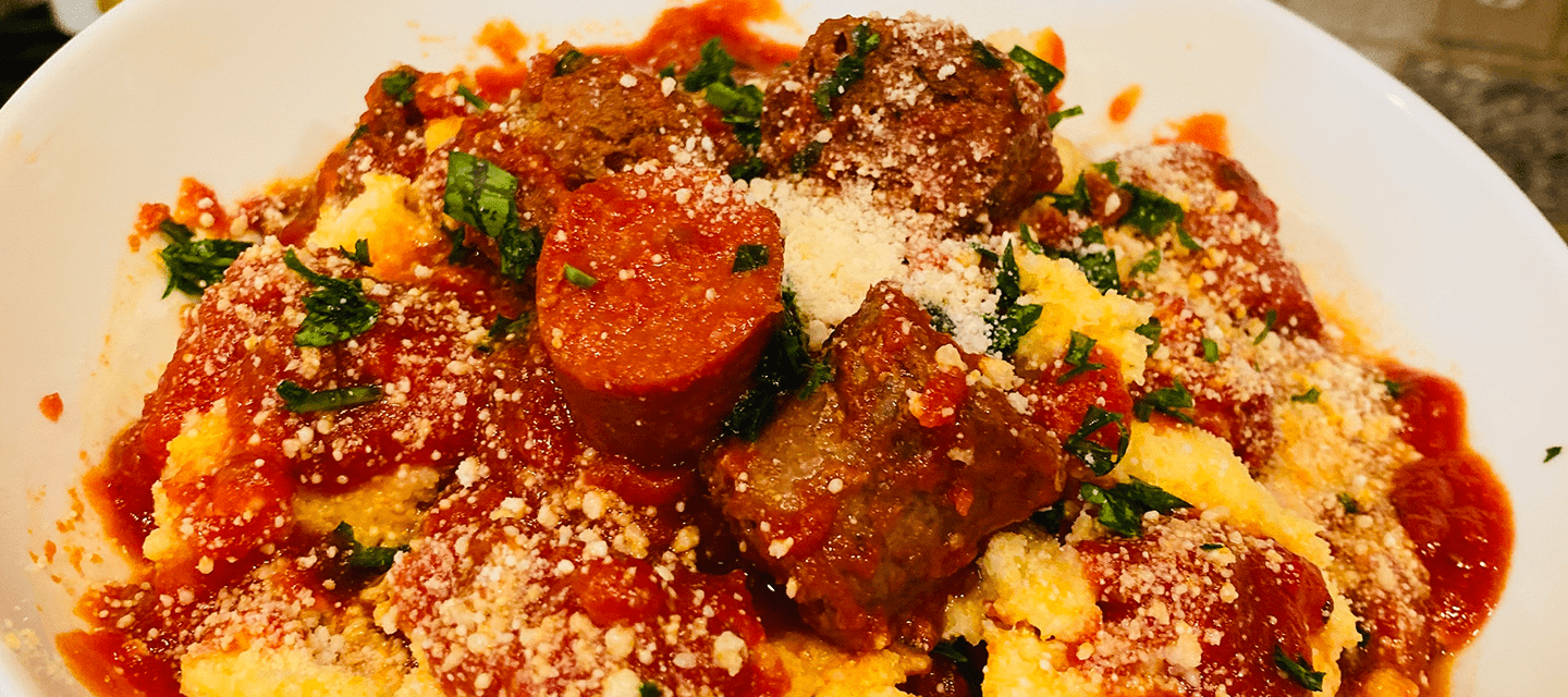 Creamy Cheesy Polenta with Spicy Sausage and Pepperoni Gravy